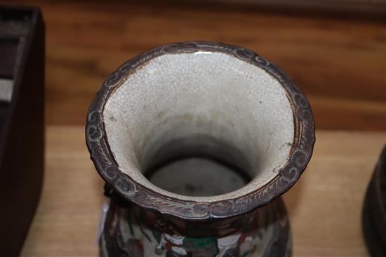 A Cantonese two handled vase, painted with warriors H.35cm